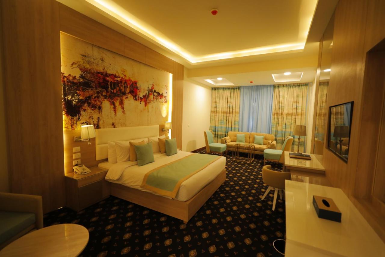 Tolip Gardens Hotel ไคโร ภายนอก รูปภาพ A room at the hotel