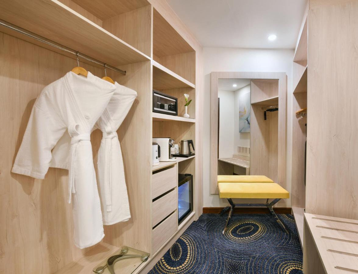 Tolip Gardens Hotel ไคโร ภายนอก รูปภาพ A room at the hotel